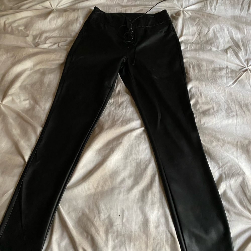 Pleather pants with criss cross detailing